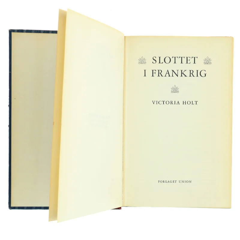 Antik bog, med flot ryg. Slottet i Frankrig af Victoria Holt (Bog)