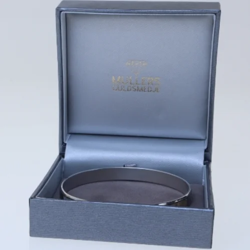 Armbånd med abalone-indlæg fra Mullers Guldsmedje (str. Ø 7 cm)