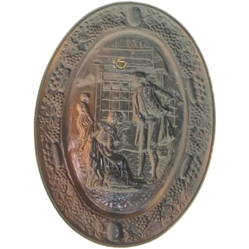 Ovalt dekorations platte med relief (str. 39x29 cm)