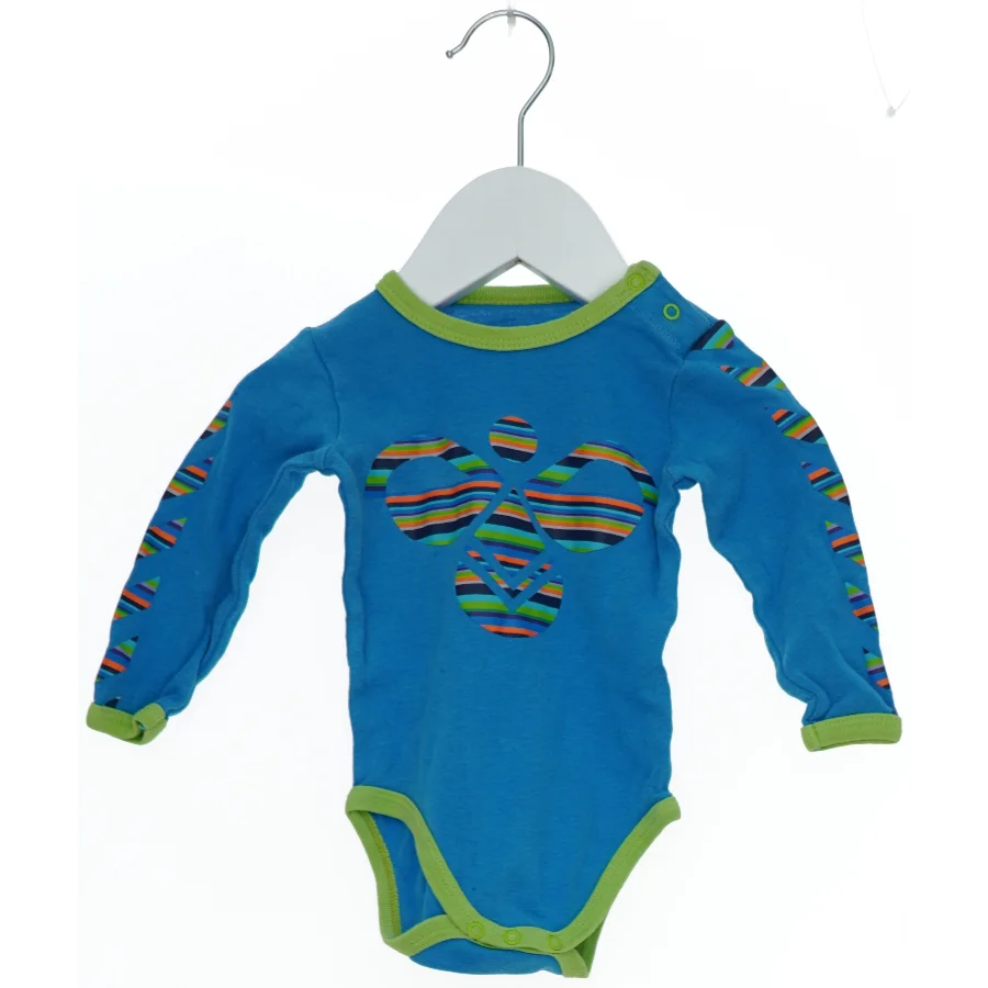 Blå langærmet bodystocking med mønstrede detaljer fra Hummel (str. 62)