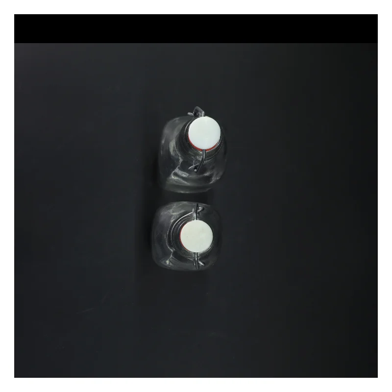 2 Glasflasker med patentl (str. 26 cm)