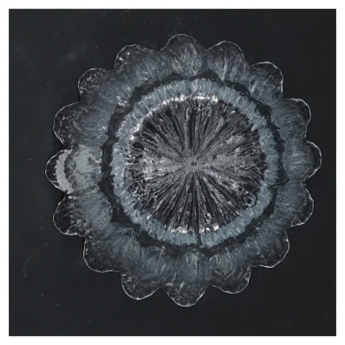 Glas skål med bølget kant fra Holmegaard (str. 10x7 cm)