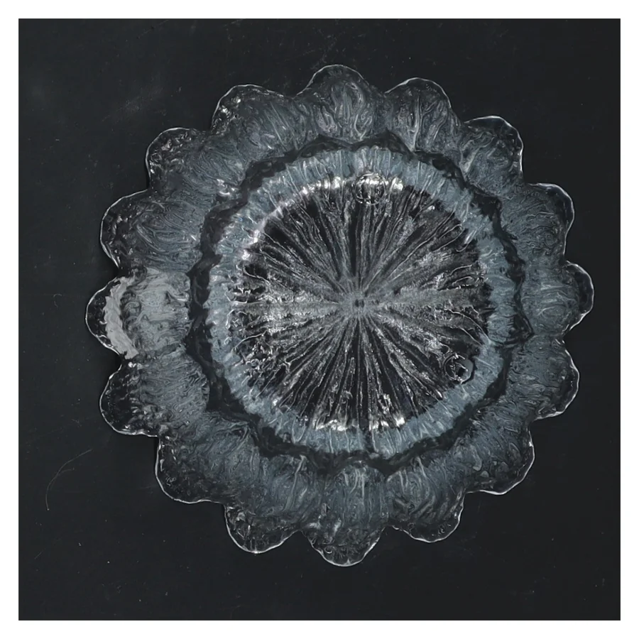 Glas skål med bølget kant fra Holmegaard (str. 10x7 cm)