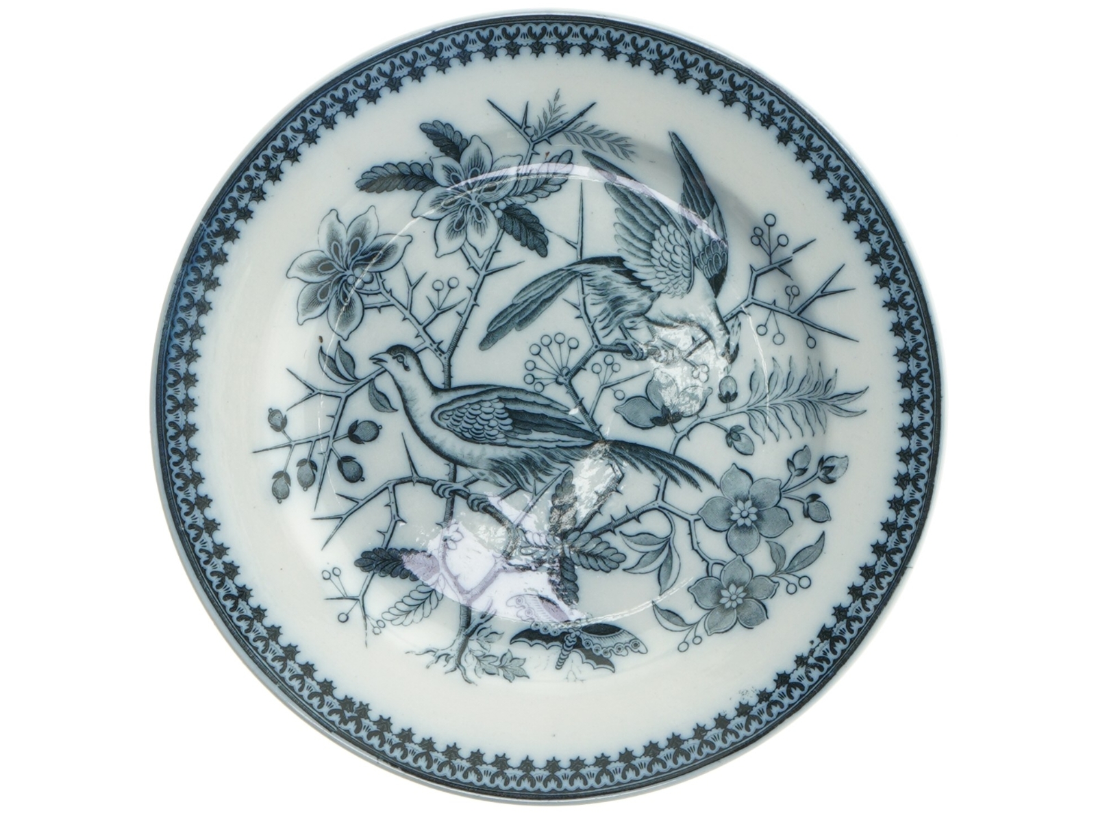 To porcelæns frokosttallerken med fuglemotiv