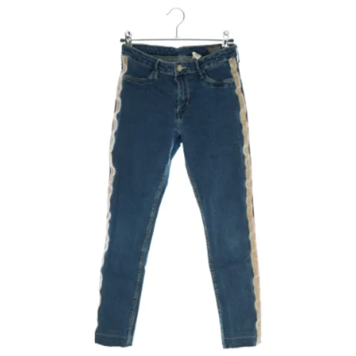 Cowboybukser fra H&M (str. 158)