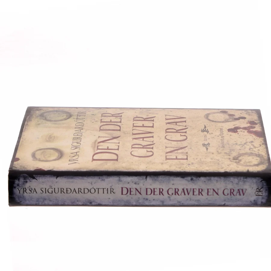 Den der graver en grav af Yrsa Sigurðardóttir (Bog)
