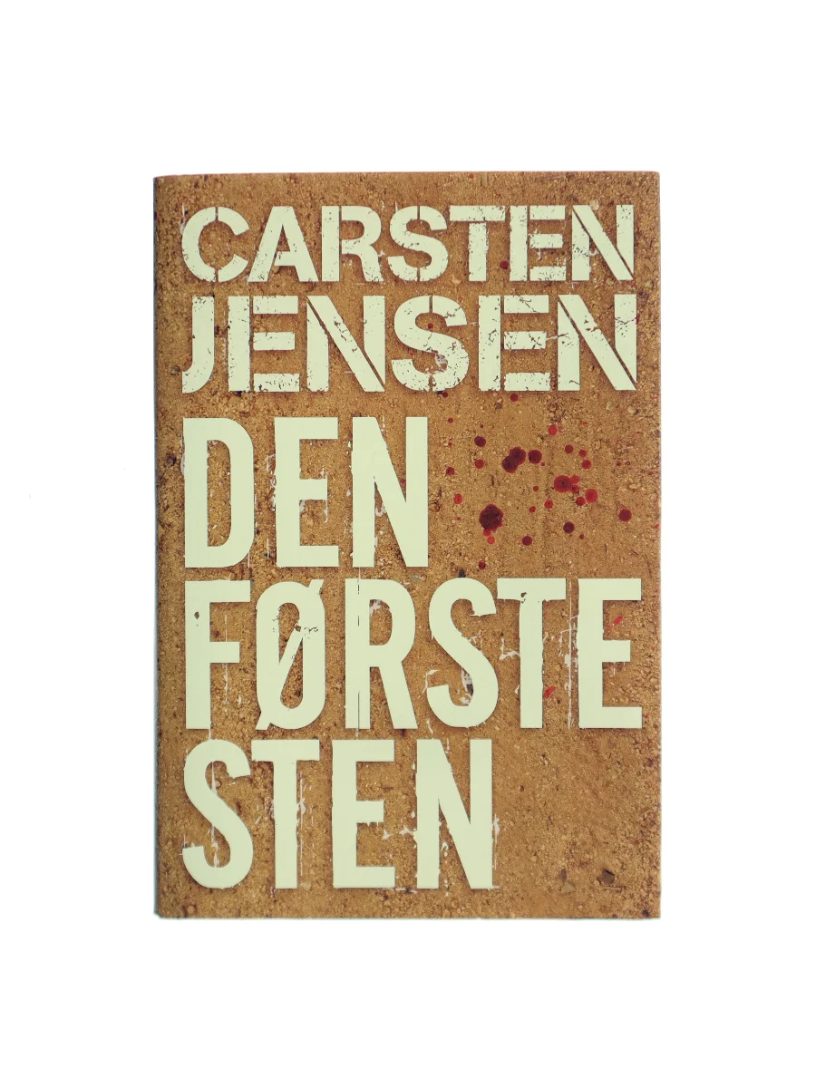Forsiden af Den første sten af Carsten Jensen