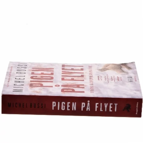 Pigen på flyet af Michel Bussi (Bog)