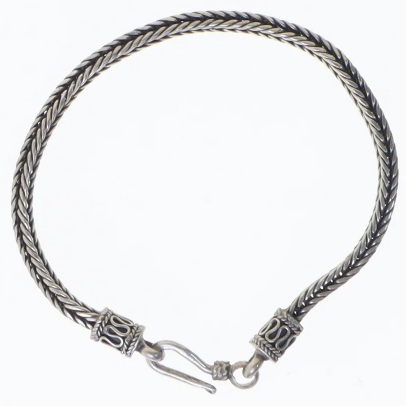 Armring i flettet sølv (str. 18 cm)