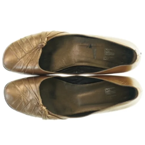 Damesko i bronzefarve fra Billi Bi (str. 41 )