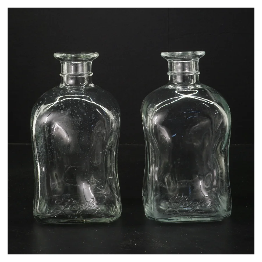 Glasflasker med skrift fra Ziegler (str. 17,5 cm)