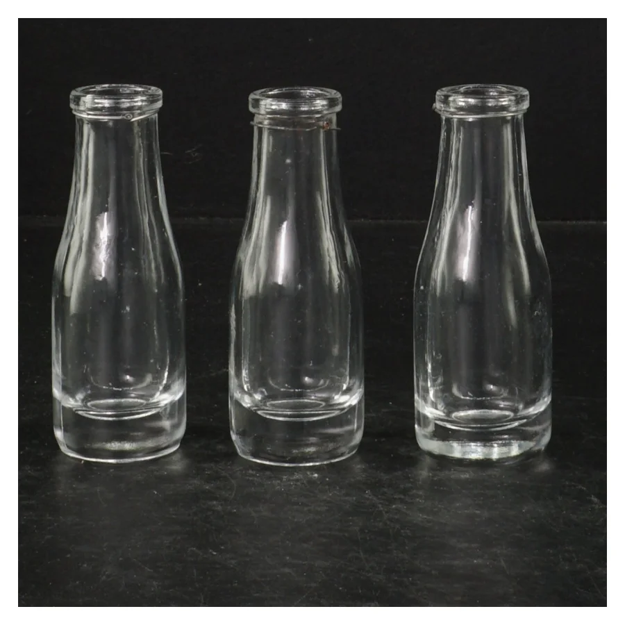 Tre små glasflasker (str. 10 cm)