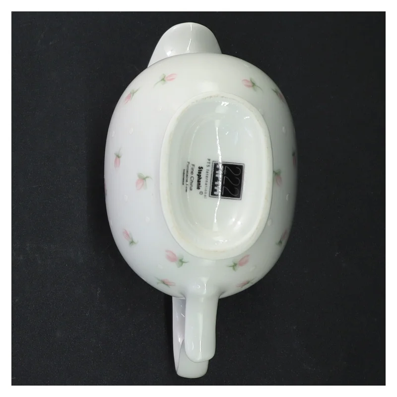 Porcelænskande med blomstermotiv (str. 14 cm)