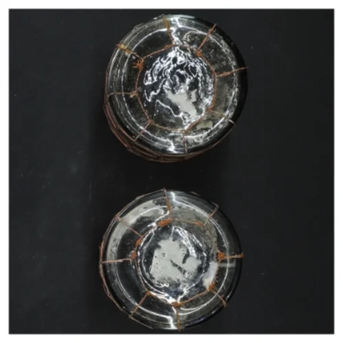 To Rustikke glaskrukker med net (str. 10x8 cm)