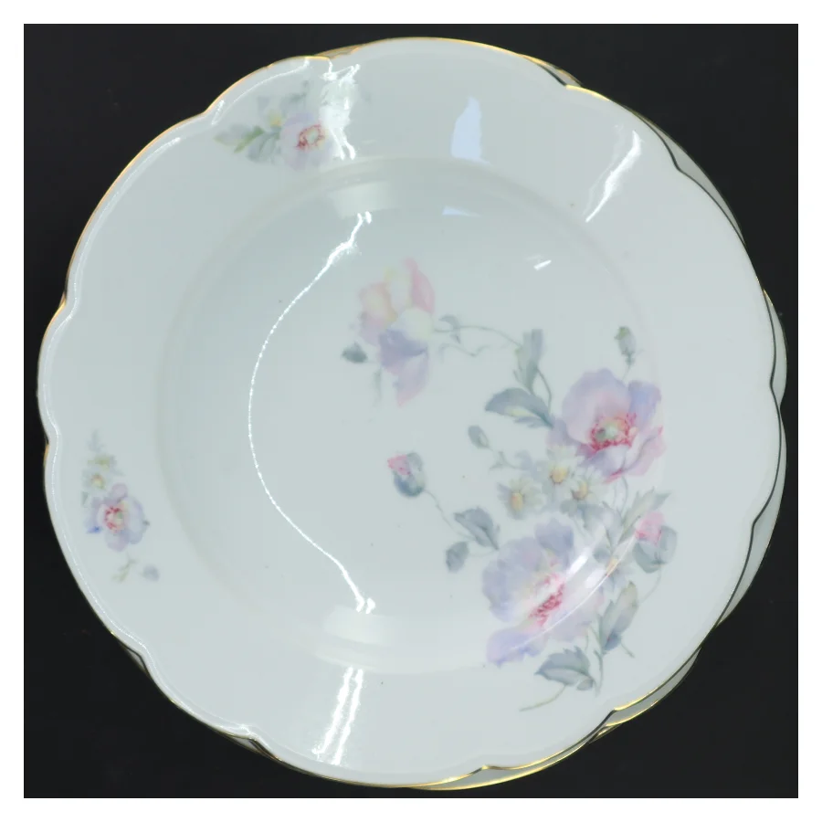 Sæt af dekorative porcelænskåle (str. Ø 25x4 cm)