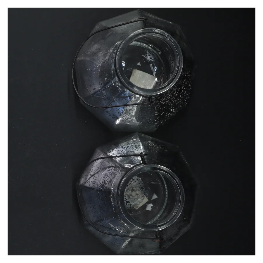 2 Glaslanterner med hank (str. Ø. 15 cm. )