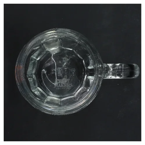 Ølkrus med Natholdet logo (str. Ø 8,5 cm længde 11,5 cm)