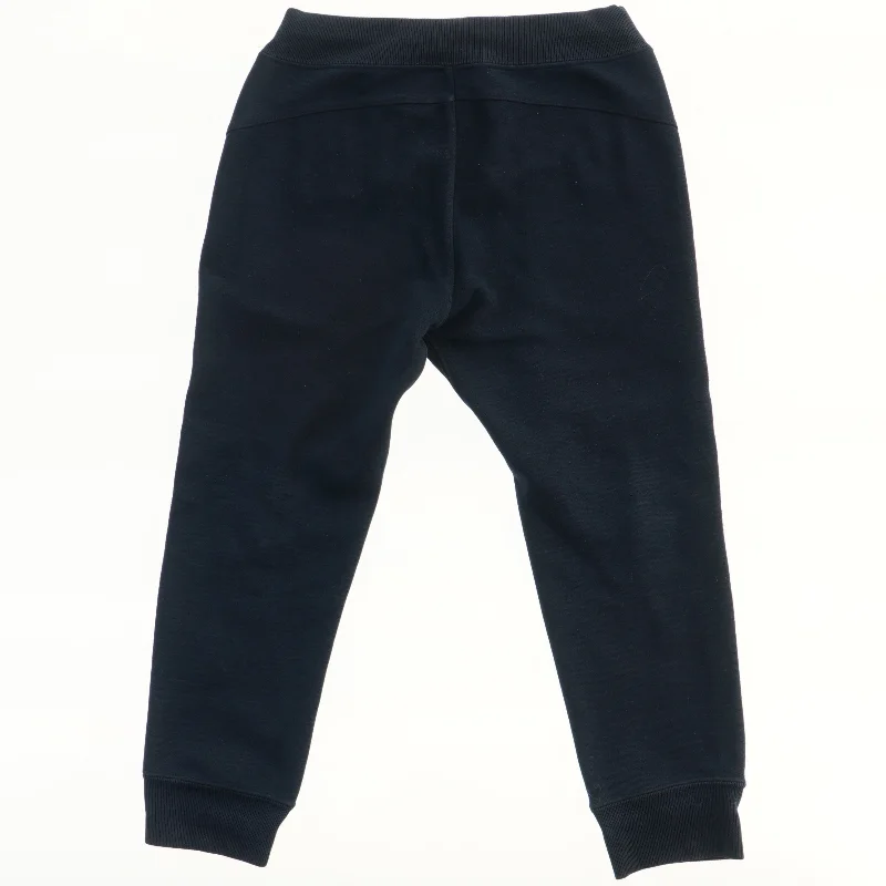 Bukser med lynlåslommer fra Uniqlo (str. 116)