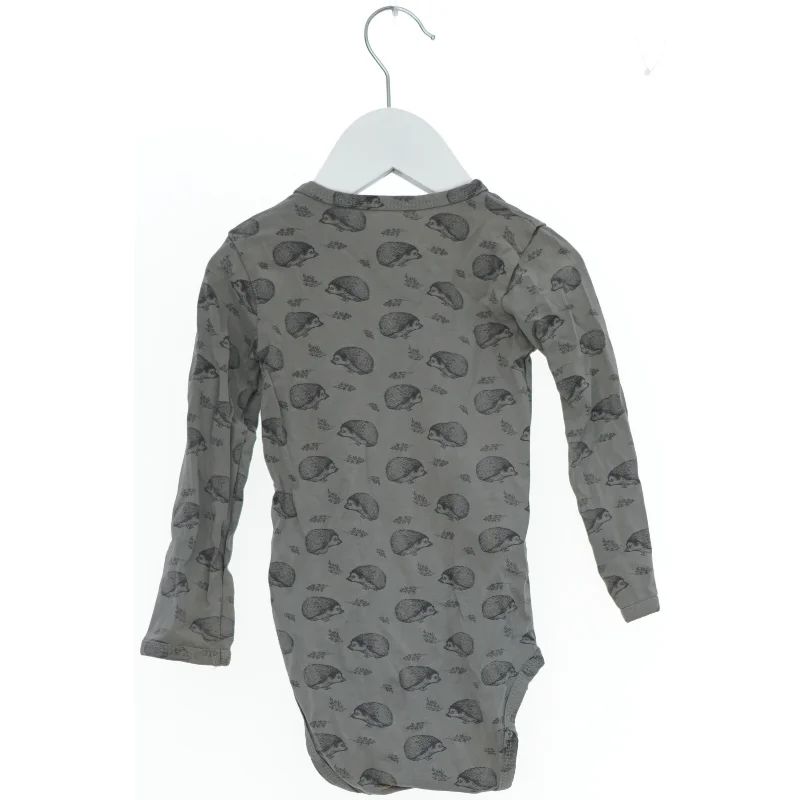 Langærmet bodystocking med pindsvinemønster fra Petit (str. 86)