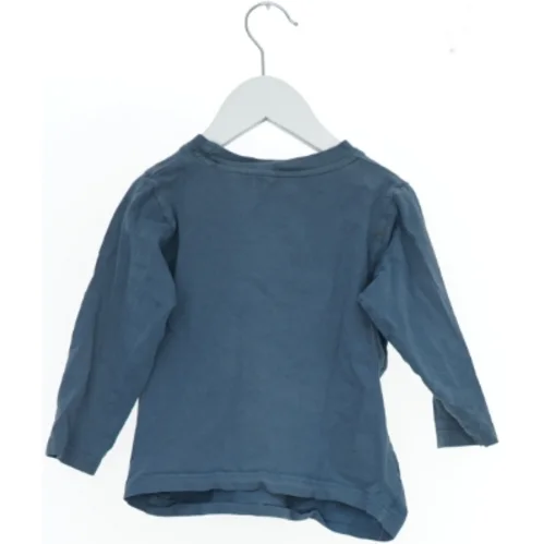 Langærmet blå bluse fra Exit (str. 92)