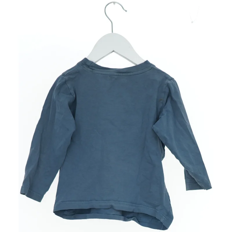 Langærmet blå bluse fra Exit (str. 92)