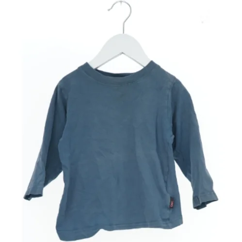 Langærmet blå bluse fra Exit (str. 92)