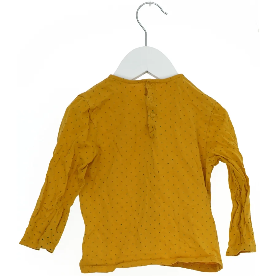 Langærmet gul bluse med prikker til børn fra Kiabi (str. 92)
