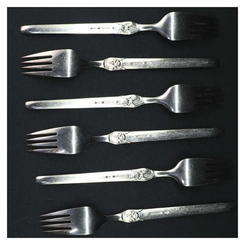 Sølvfarvede kagegafler