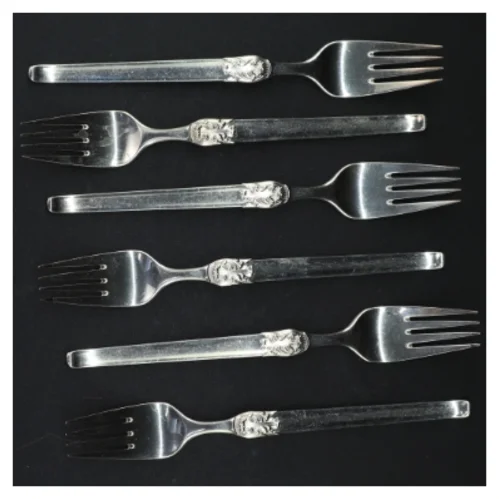 Sølvfarvede kagegafler