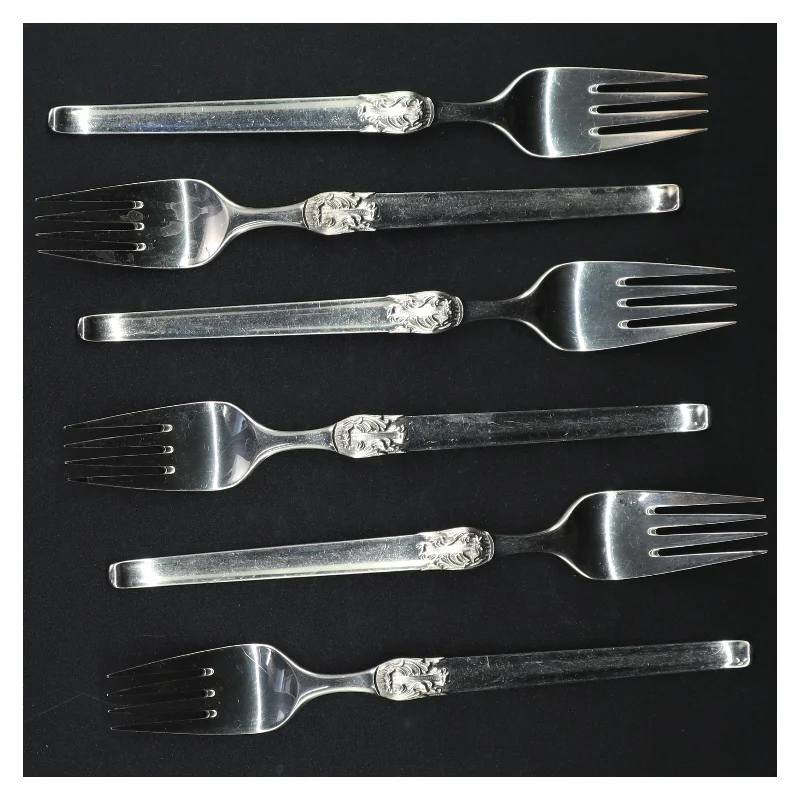 Sølvfarvede kagegafler