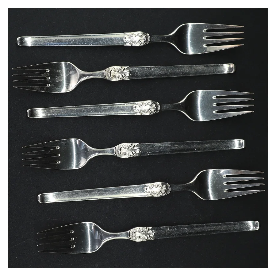 Sølvfarvede kagegafler