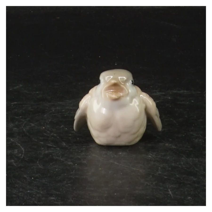 Porcelænsfigur af fugl (str. 4 cm)