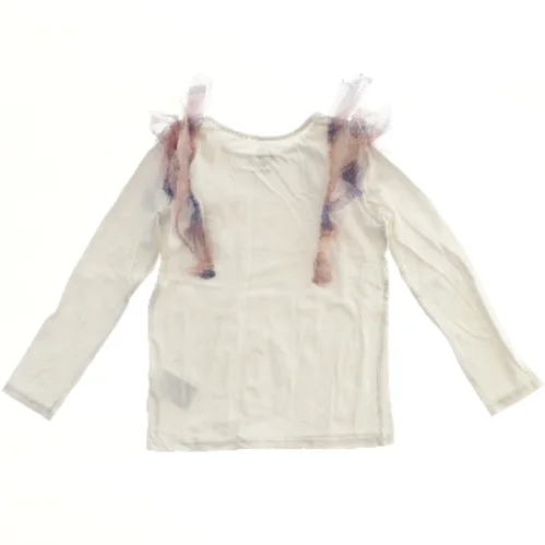 Langærmet bluse med tyl detaljer fra H&M (str. 122)