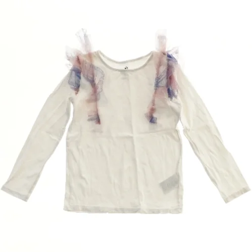 Langærmet bluse med tyl detaljer fra H&M (str. 122)