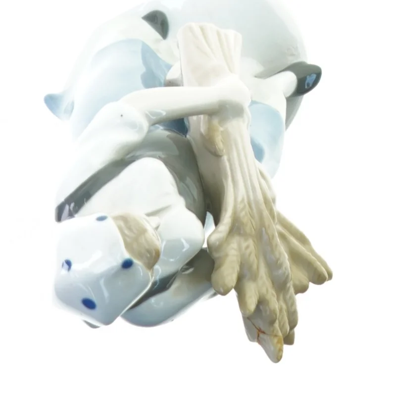 Bondepige i porcelæn fra Royal Copenhagen (str. 25 x 8 cm)