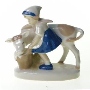 Malke pige i porcelæn (str. 11 x 6 x 13 cm)