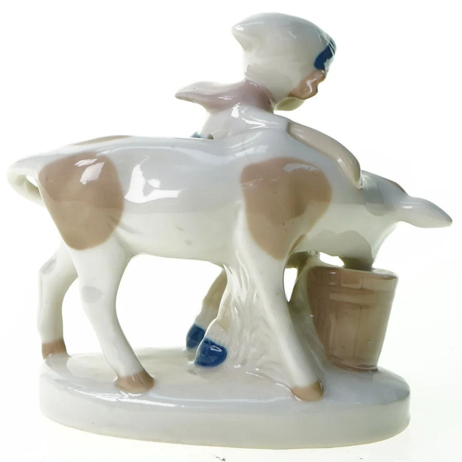 Malke pige i porcelæn (str. 11 x 6 x 13 cm)