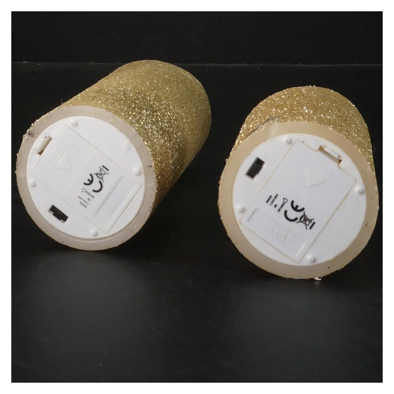 Sirius LED stearinlys med guldglitter fra Magasin  (str. 15x7,5&10x7,5 cm)