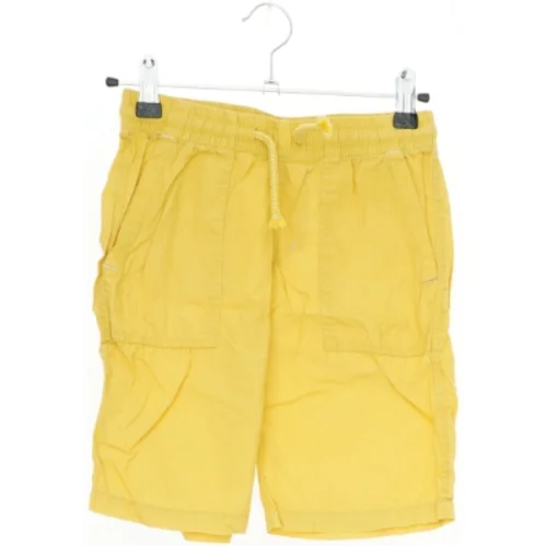 Gule shorts med elastik og snøre fra H&M (str. 122)