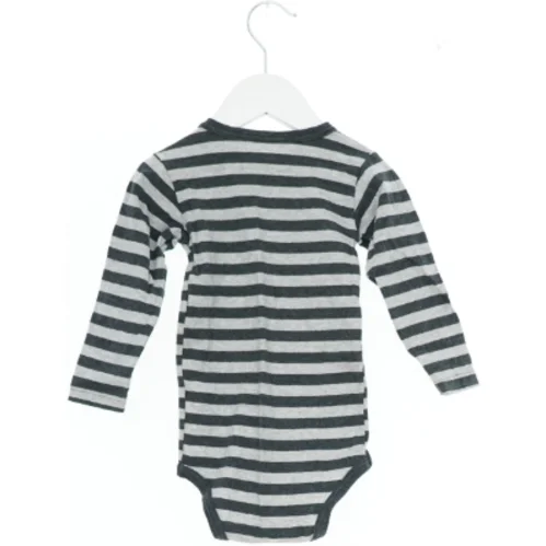 Langærmet body med striber (str. 80)