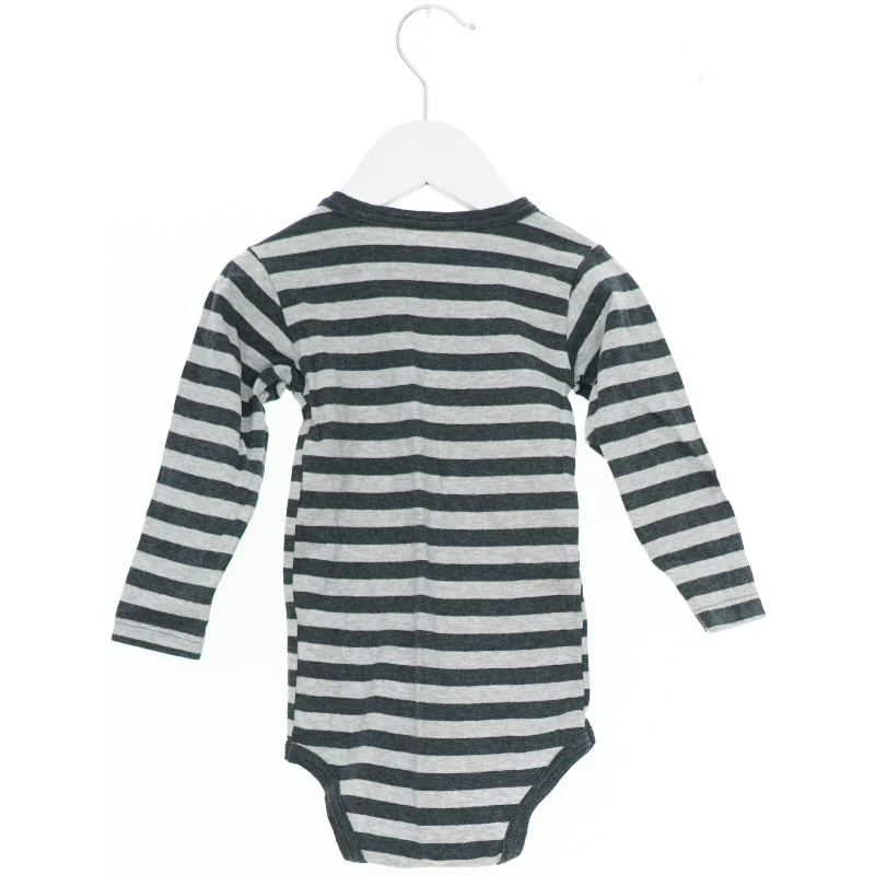 Langærmet body med striber (str. 80)