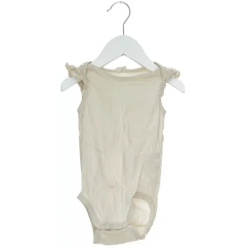 Cremefarvet body fra H&M (str. 80)