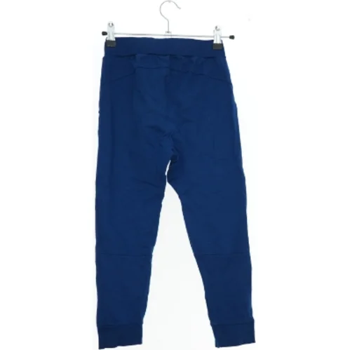 Blå træningsbukser fra Hummel (str. 122)