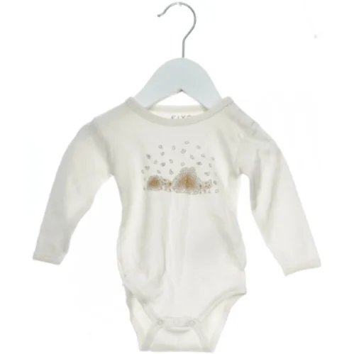 Langærmet body fra Fixoni (str. 62)