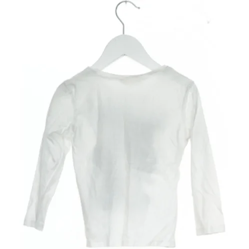 Langærmet t-shirt med rumdesign fra H&M (str. 104)