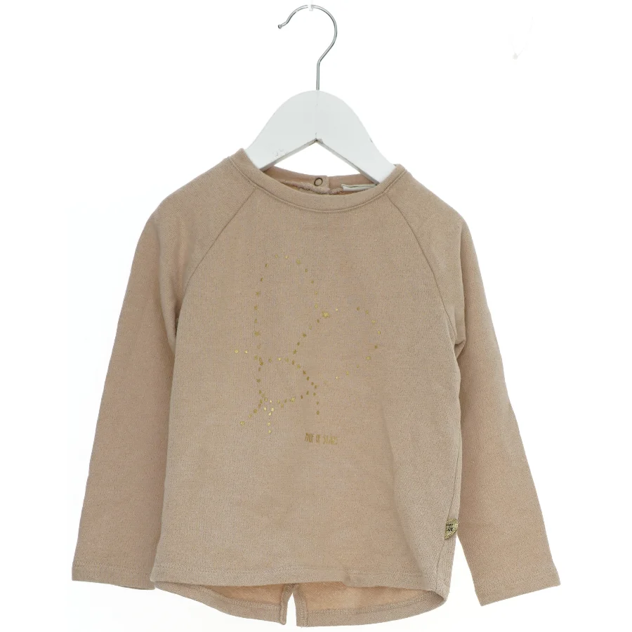 Langærmet bluse med gyldent tryk fra Pomp de Lux (str. 98)