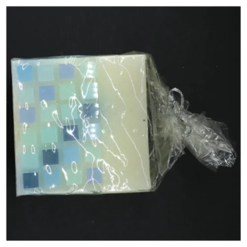 Dekorativt stearinlys med mosaikmønster