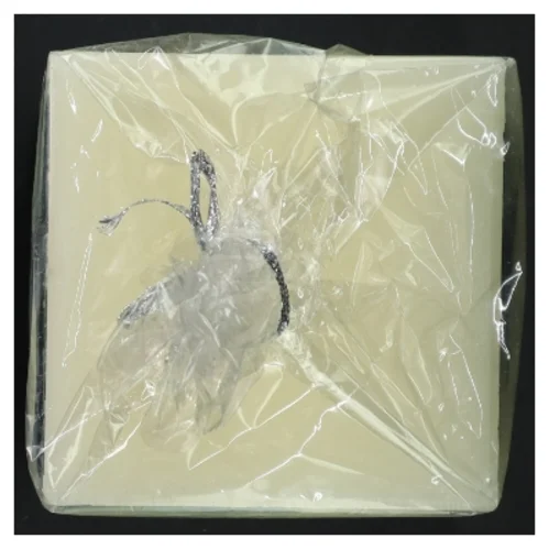 Dekorativt stearinlys med mosaikmønster