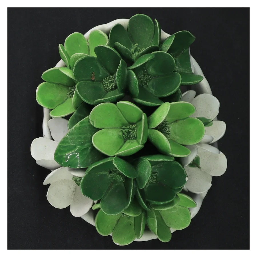 Kunstig sukkulent i keramikpotte