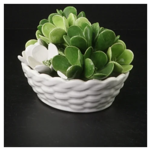 Kunstig sukkulent i keramikpotte